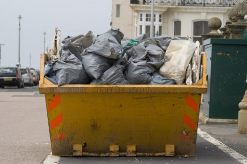 Rubbish clearance team removing items in West Ealing