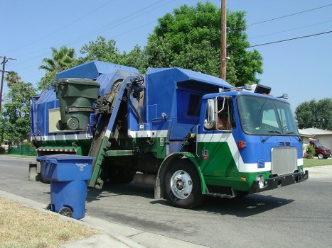 Waste collection trucks servicing West London communities