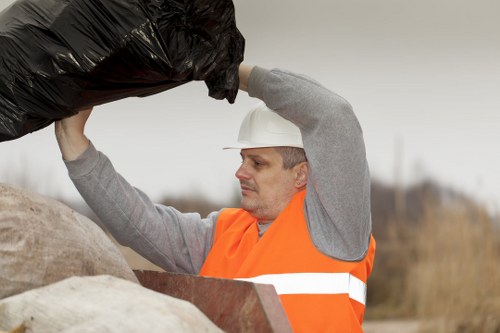 Professional rubbish being loaded for removal in West London